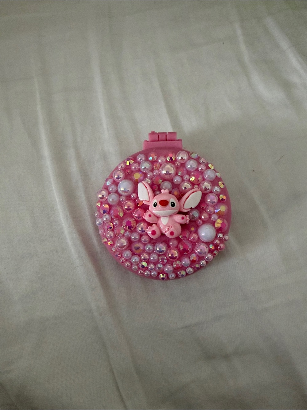 Round Pink Travel Accessory Case with Textured Black Insert